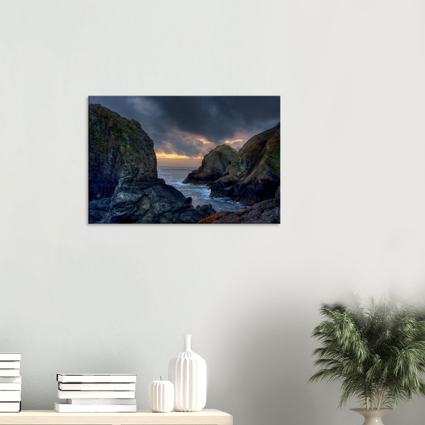 Tranquil Mullion Cove at sunset with glowing rock faces