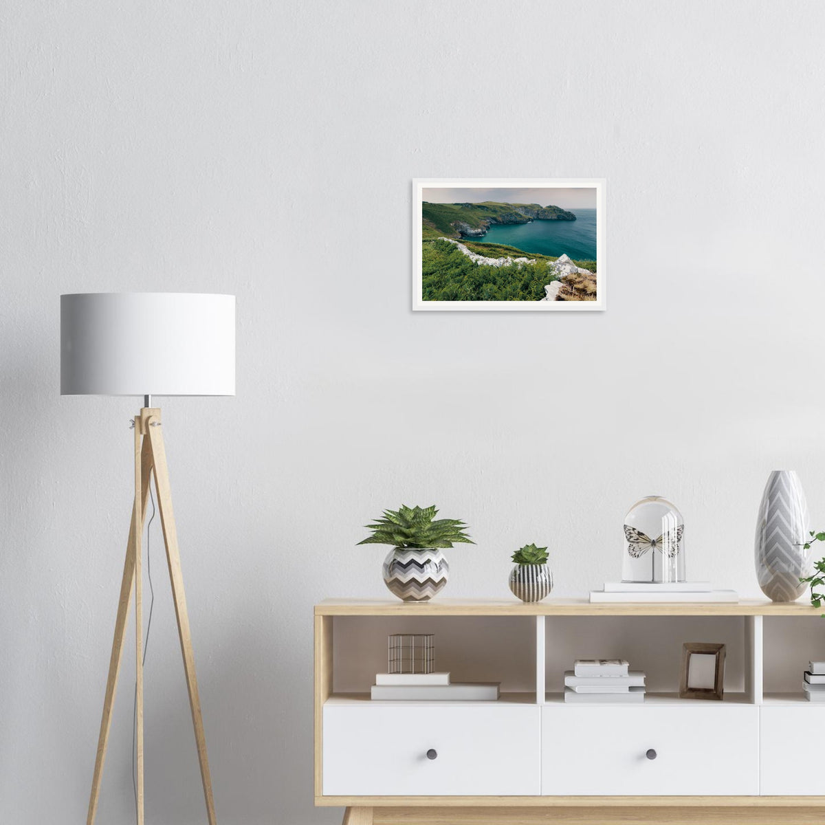 Framed print of Trethevy Tintagel cliffs and azure waters