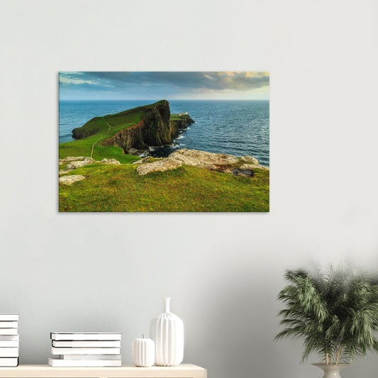 Canvas print of Neist Point on the Isle of Skye featuring cliffs, green hills, and a distant lighthouse.