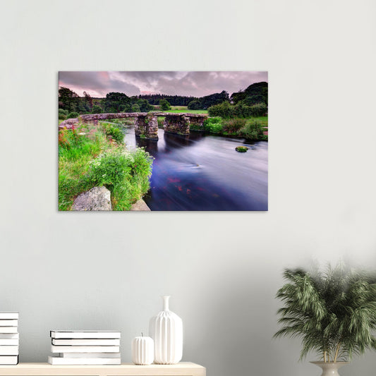 Canvas print of Postbridge clapper bridge in Dartmoor National Park