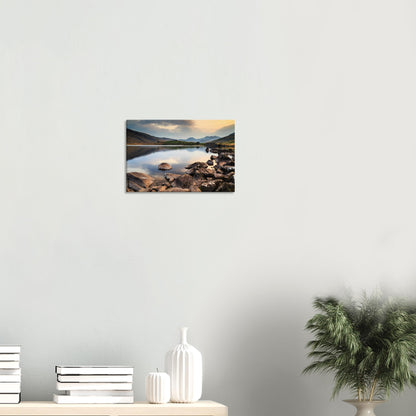Canvas artwork showing majestic Snowdonia peaks silhouetted against a softly glowing sunset