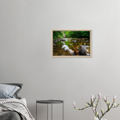 Framed artwork of Newbridge surrounded by lush greenery
