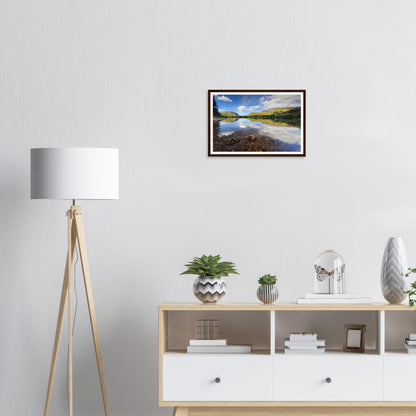 Perfect reflections of fells and clouds in Buttermere framed print