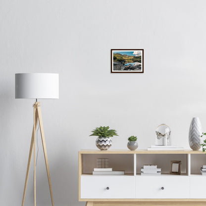Rocks on shore of Llyn Llywelyn framed wall art Snowdonia