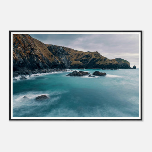 Scenic framed wall art of Mullion Cove turquoise sea and rocks