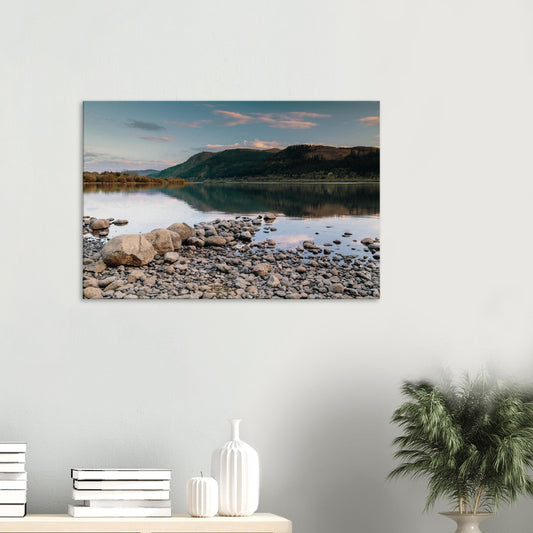 Tranquil view of Bassenthwaite Lake at dusk with soft pastel sky reflections