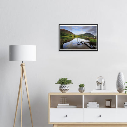 Serene reflections on Crummock Water with surrounding fells