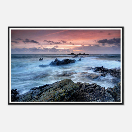 Fiery red and orange sunset sky above Heybrook Bay