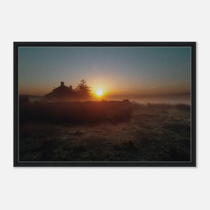 Dartmoor moorland with morning mist and rising sun
