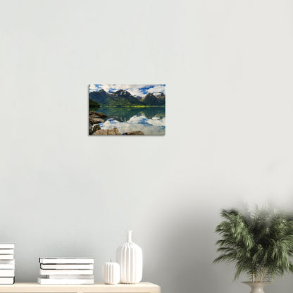 Inviting vista of Strynevatnet Lake where serene waters mirror sky and rugged alpine terrain