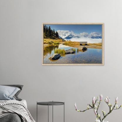 Panoramic alpine landscape with pond reflection in framed canvas