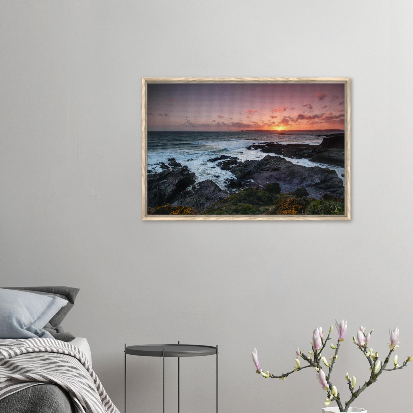 Devon coastline at dusk with glowing sea in framed canvas