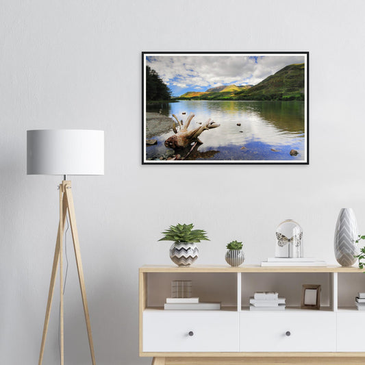 Framed print of Buttermere Lake in the Lake District with driftwood