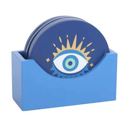 All Seeing Eye Coaster Set with four mystical designs in a matching blue holder, perfect for quirky home décor.