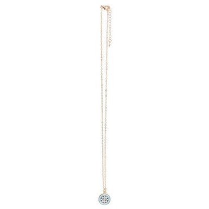 Gold-tone all seeing eye necklace on turquoise card with star accents and matching dark blue envelope.