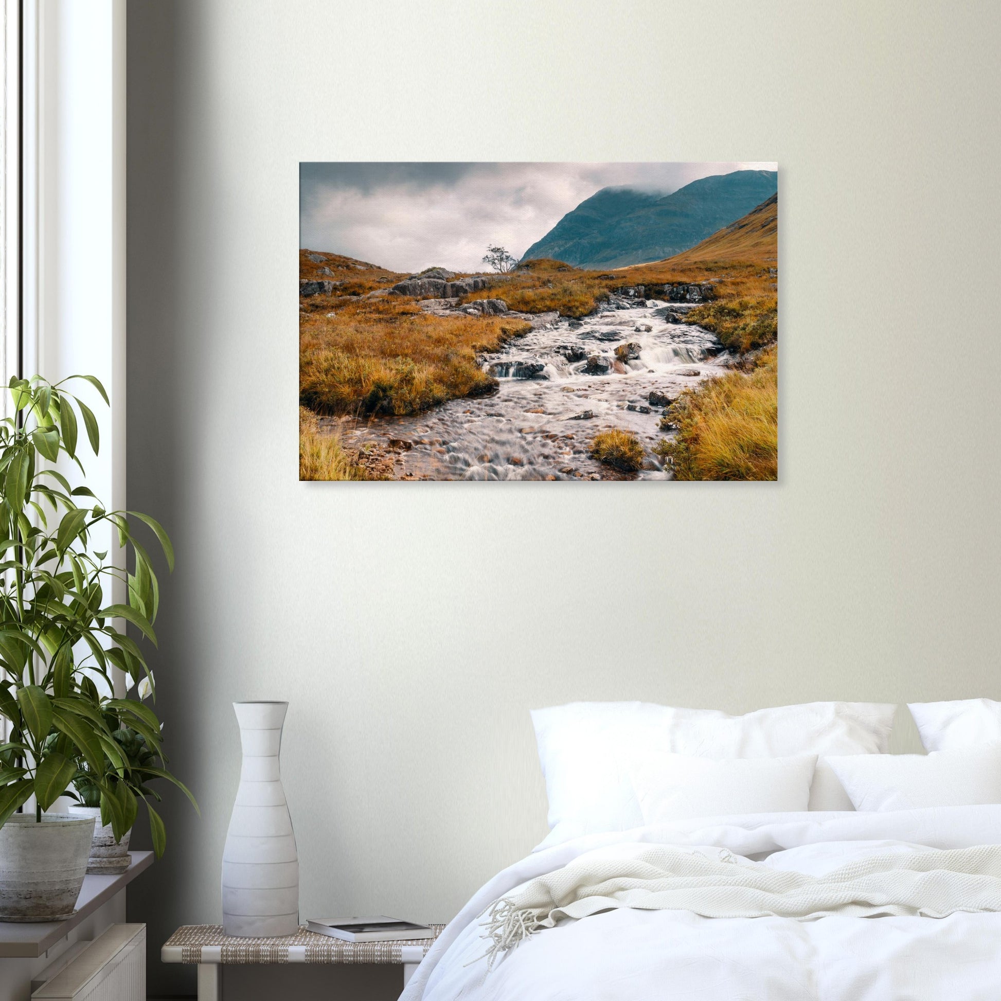 Mountain stream flowing through wild Glencoe valley