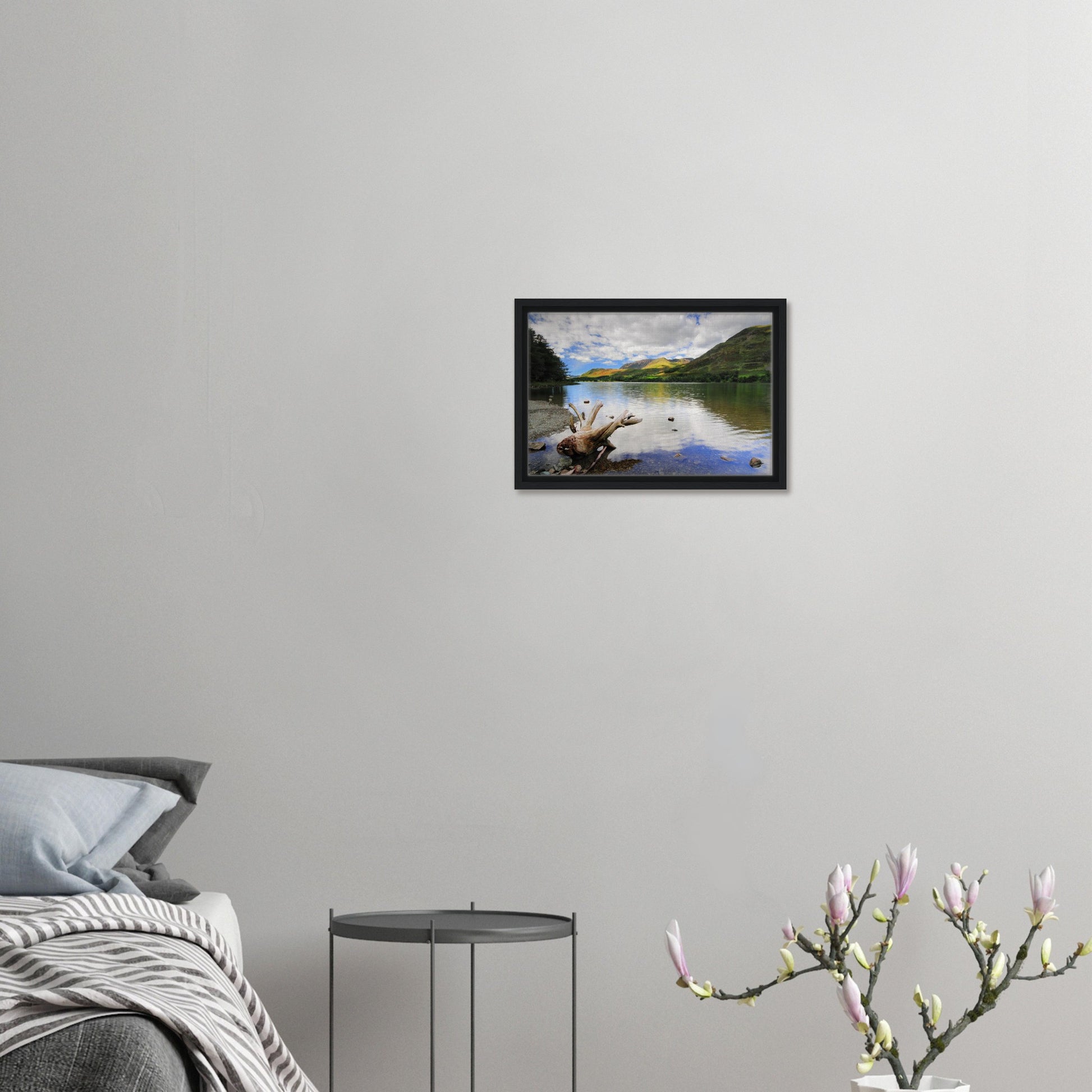Foreground driftwood and serene lake at Buttermere in print