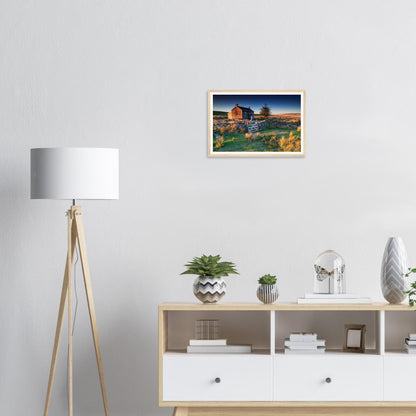 Warm golden sunrise over moorland and farmstead framed wall art
