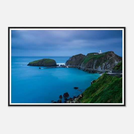 Historic lighthouse on cliffs at Landing Bay framed print