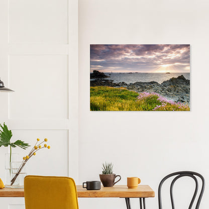 Canvas artwork capturing a radiant sky and soft floral detail at Guernsey’s Pleinmont Point with Les Hanois Lighthouse in view.