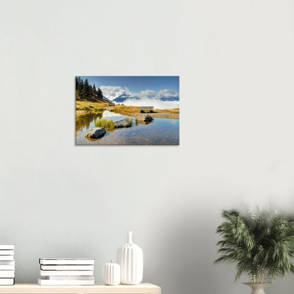 Canvas print capturing the peaceful beauty of Austria’s Panoramabahn with a reflective pond and misty mountain view.