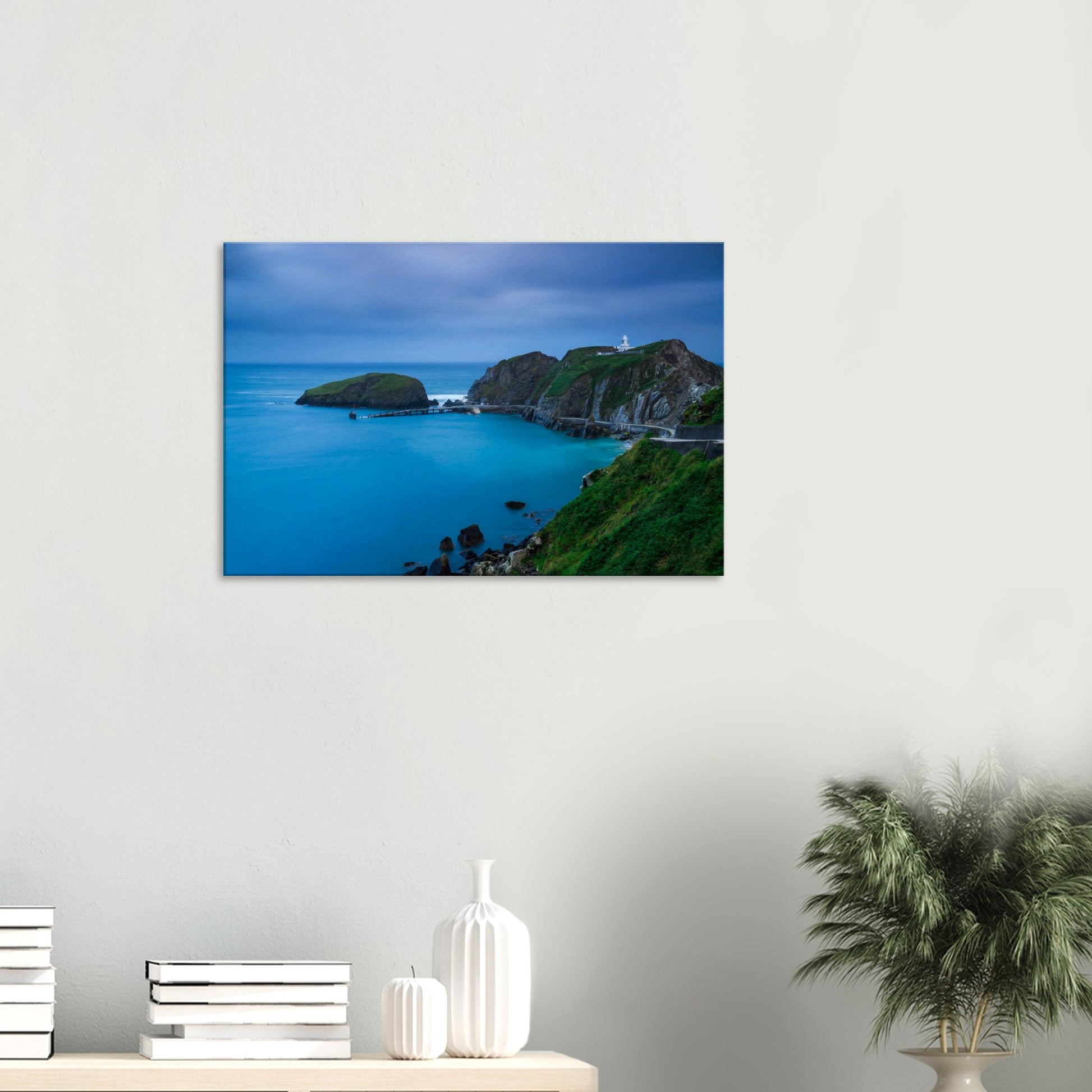 Canvas wall art of Lundy Island’s coastline at dusk, showing a historic lighthouse and a peaceful sea embraced by soft twilight hues.