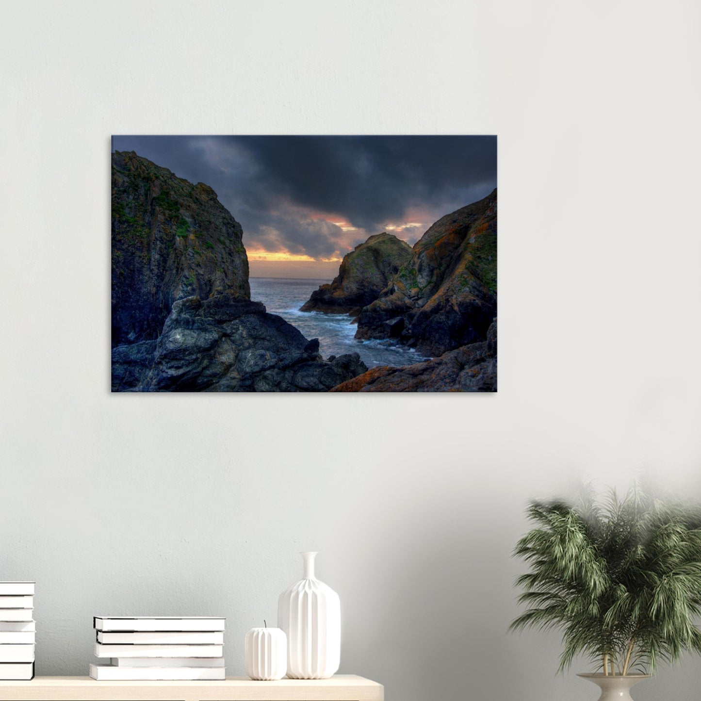 Sunset light illuminating Mullion Cove’s rocky cliffs in wall art
