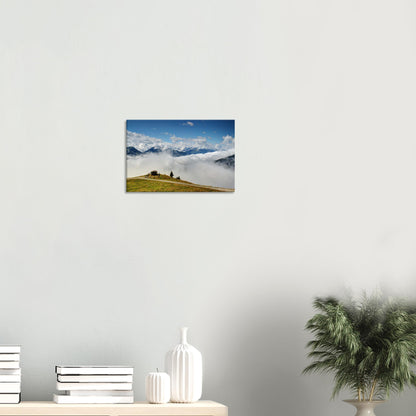 Peaceful alpine canvas print with a hilltop hut at Resterhöhe above clouds, surrounded by the rugged majesty of the Austrian Alps.