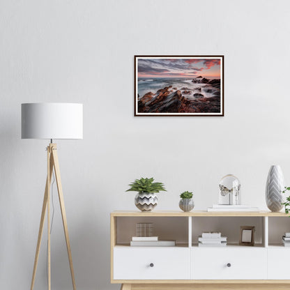 Jagged rocks leading to the Mewstone at Wembury Beach framed print