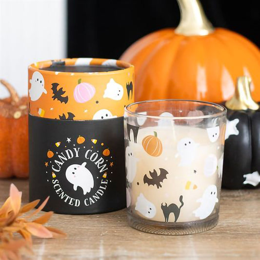 Candy corn scented Halloween candle in glass jar with ghost design