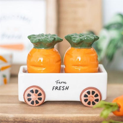 Carrot-shaped salt and pepper shakers in a matching cart