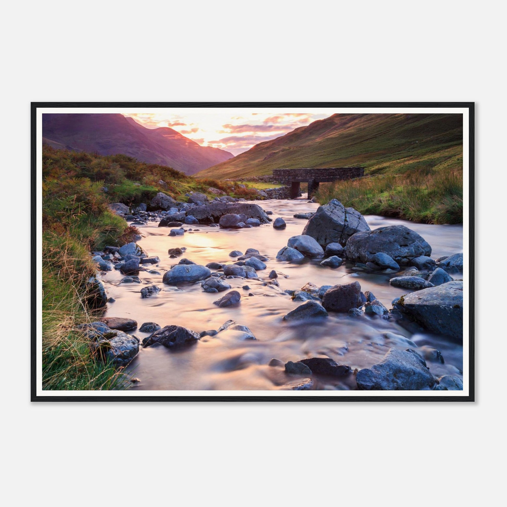 Rugged Honister Pass landscape bathed in warm evening light
