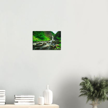 Lealt Falls scenic canvas with rushing waterfall softened by long exposure, surrounded by mossy rocks and green plants.