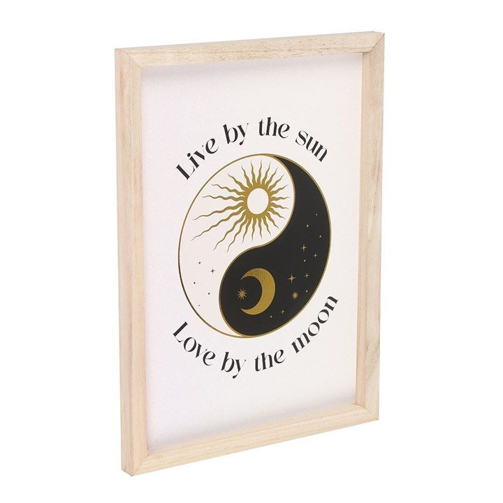 Framed celestial yin and yang print with "Live by the sun, love by the moon" text.