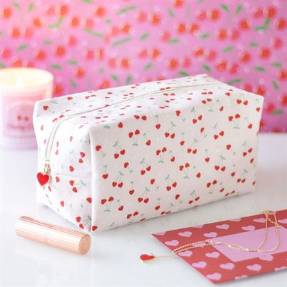 Cherry Heart Zippered Makeup Bag with baby pink background, cherry heart design, and red heart zip.