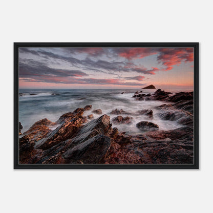 Evening sky with pink and orange tones over Wembury Beach and the Mewstone