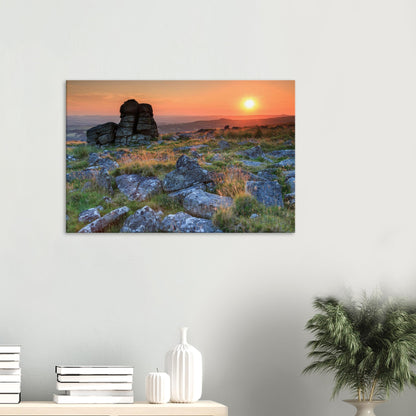 Timeless landscape of Leeden Tor surrounded by moorland grasses glowing in evening sunlight