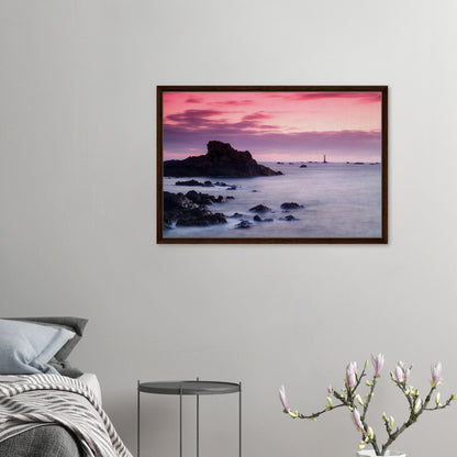 Tranquil framed canvas of Guernsey lighthouse at golden hour