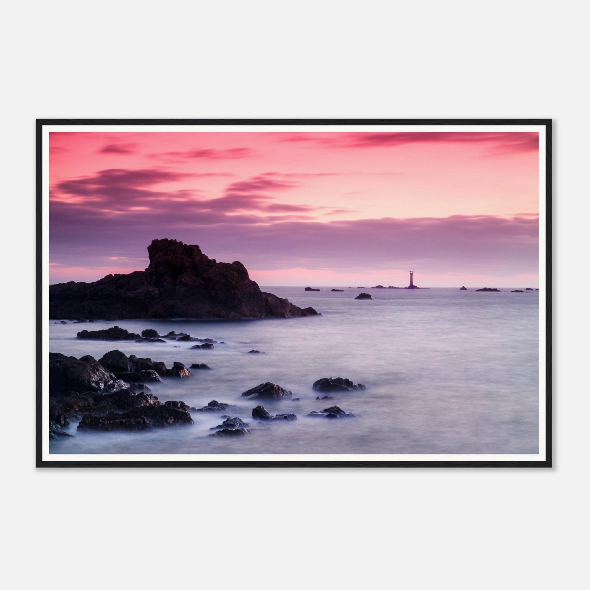 Soft pink and purple sky over Les Hanois Lighthouse framed art