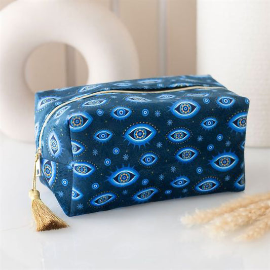 Dark blue velvet makeup bag with celestial all seeing eye and stars