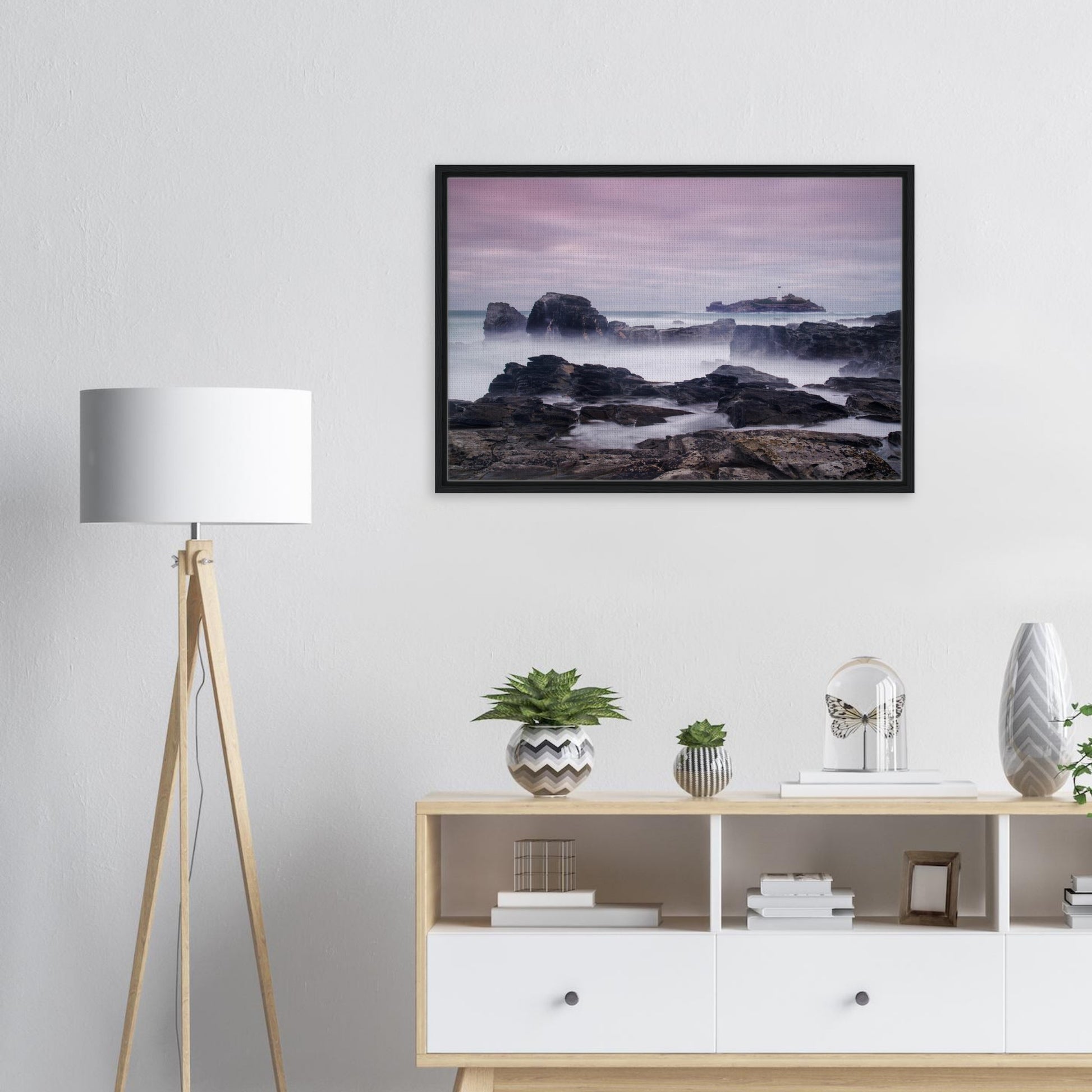 Dreamy coastal view of Godrevy Lighthouse and rocky shoreline
