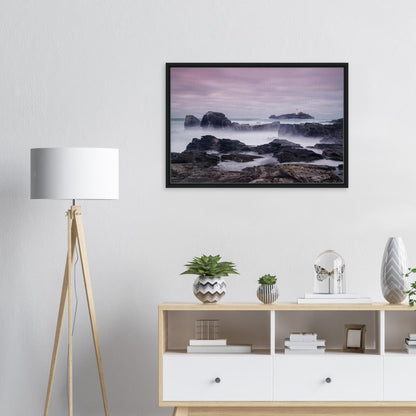 Dreamy coastal view of Godrevy Lighthouse and rocky shoreline