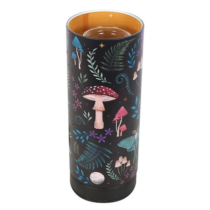 Electric aroma lamp with mystical forest design, stars that light up, and fragrance oil or wax melt compatibility.