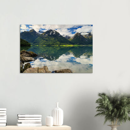 Canvas print of Strynevatnet Lake in Norway showing pristine waters reflecting cotton clouds and towering peaks