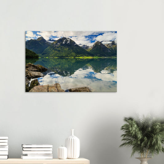 Canvas print of Strynevatnet Lake in Norway showing pristine waters reflecting cotton clouds and towering peaks