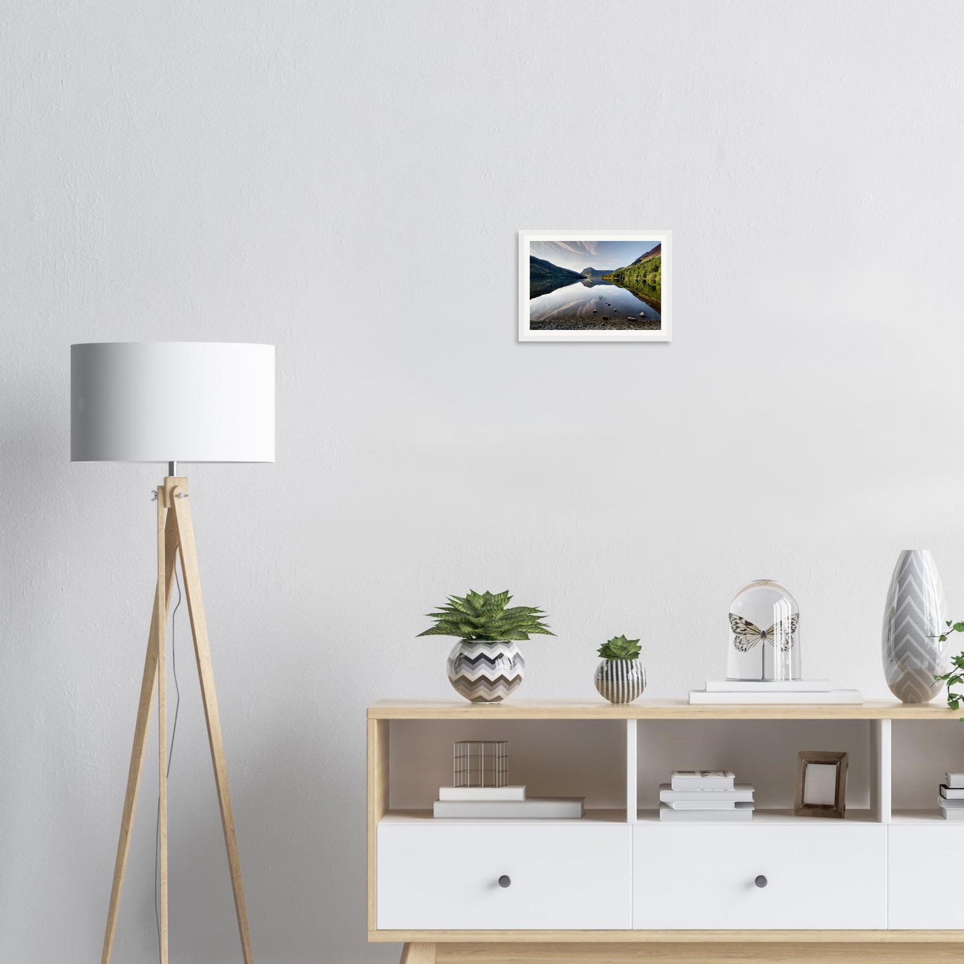 Framed art of Buttermere with sky and peaks reflected in water