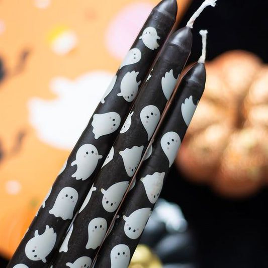 Set of three ghost print taper candles for Halloween décor