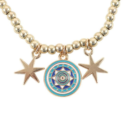 Gold beaded bracelet featuring all seeing eye and two star charms