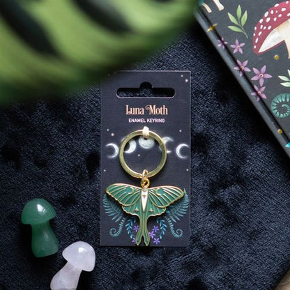 Gold-tone enamel Luna Moth keyring on decorative backing card