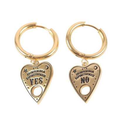 Gold-tone stainless steel talking board planchette earrings on small gold hoops, presented on a matching backing card.